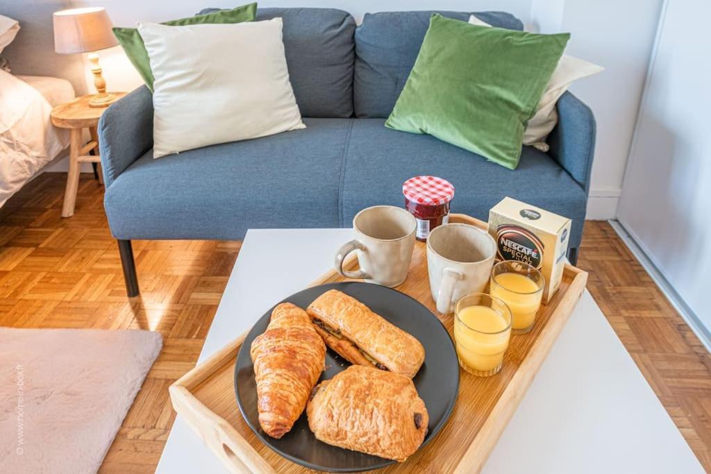 Suresnes : Appart Cosy Au Pied De Paris La Defense Exterior foto