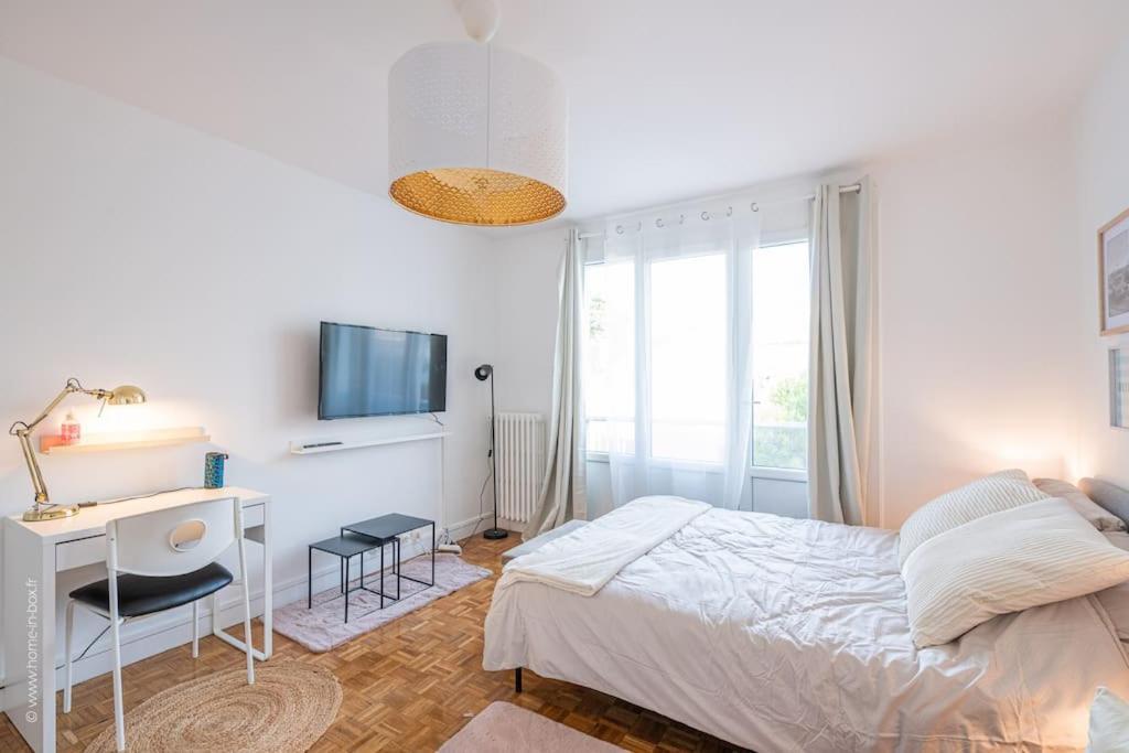 Suresnes : Appart Cosy Au Pied De Paris La Defense Exterior foto